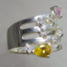 (r1133)Silver ring with cubic zirconias and stones.