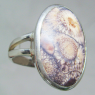 (r1137)Silver ring with oval stone.